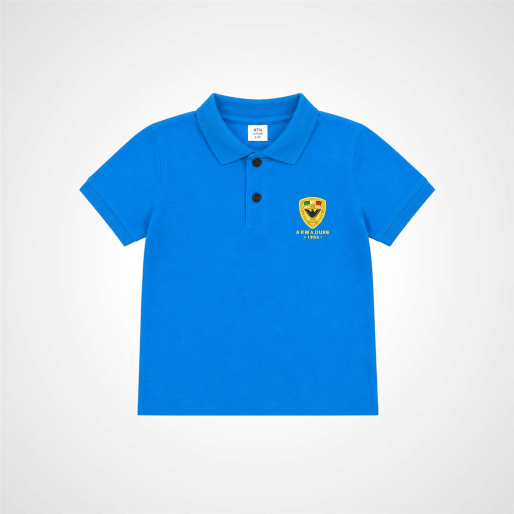 A bright blue short-sleeve polo shirt for kids, featuring a three-button placket and a yellow embroidered shield logo on the left chest that reads 'HARROGON PRIMARY'.