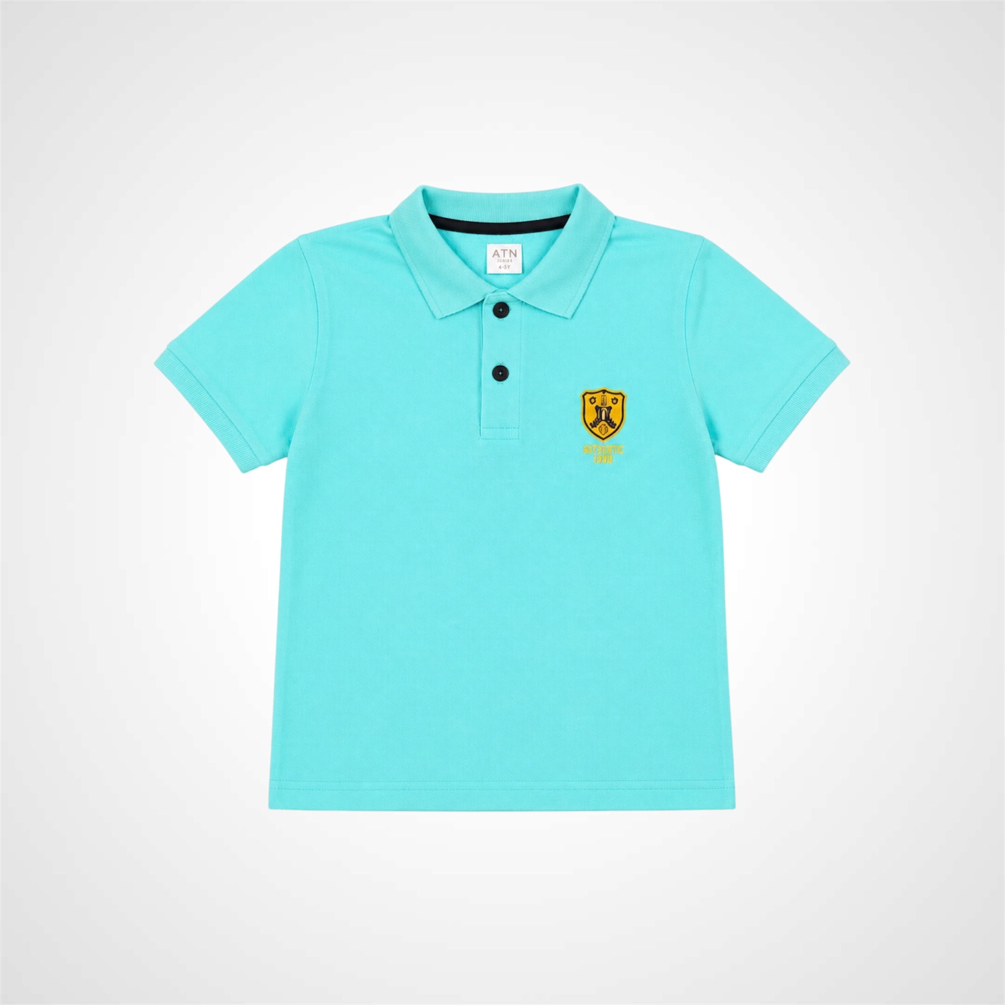 A light turquoise short-sleeve polo shirt for kids, featuring a two-button placket and a small yellow embroidered crest on the left chest, displayed on a clean white background.