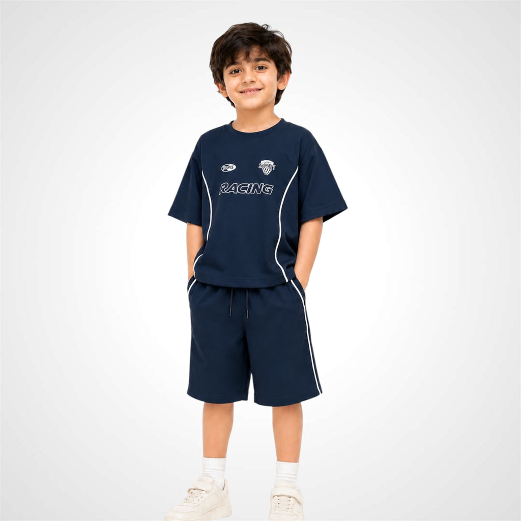 Child wearing a navy blue 'RACING' outfit on a white background