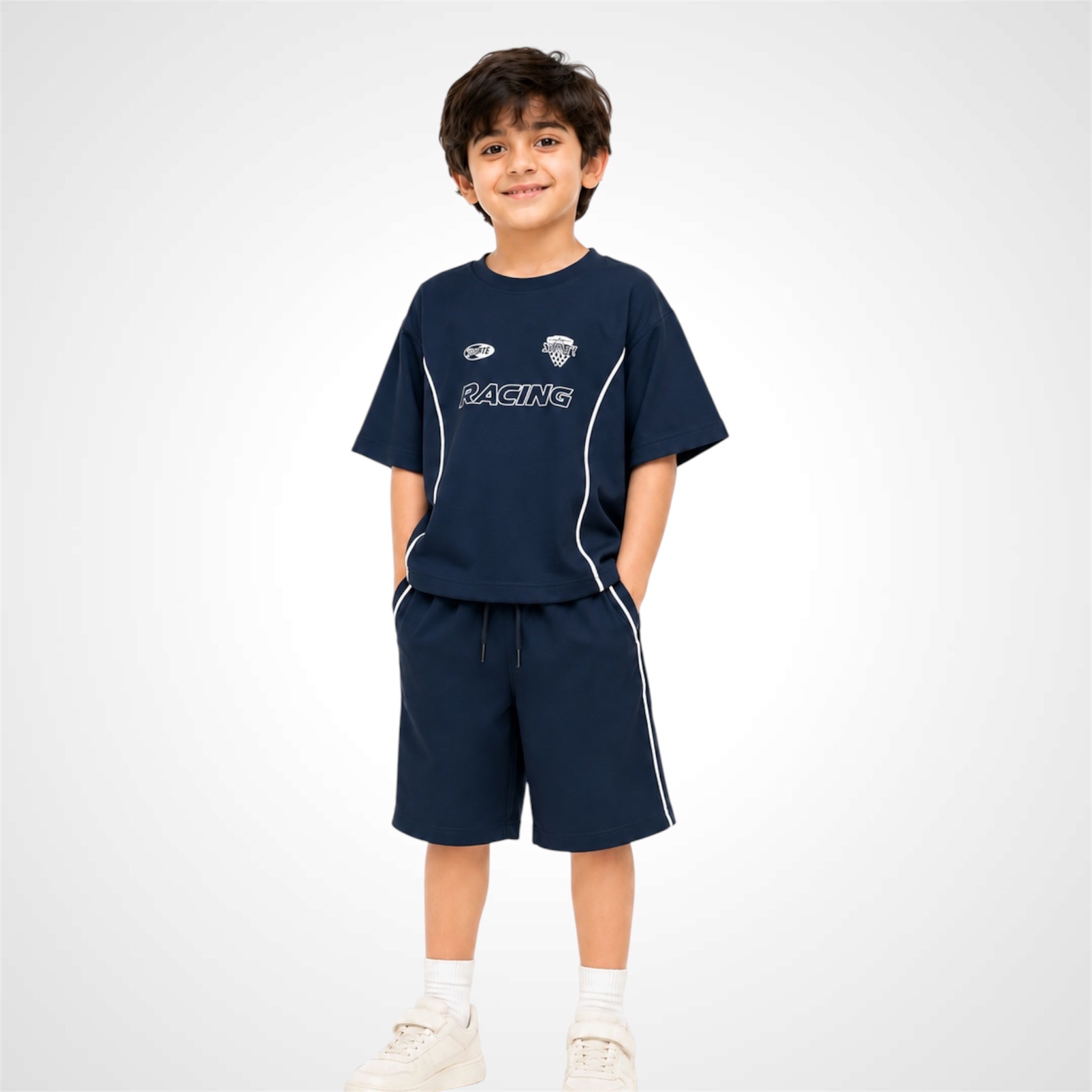 Child wearing a navy blue 'RACING' outfit on a white background