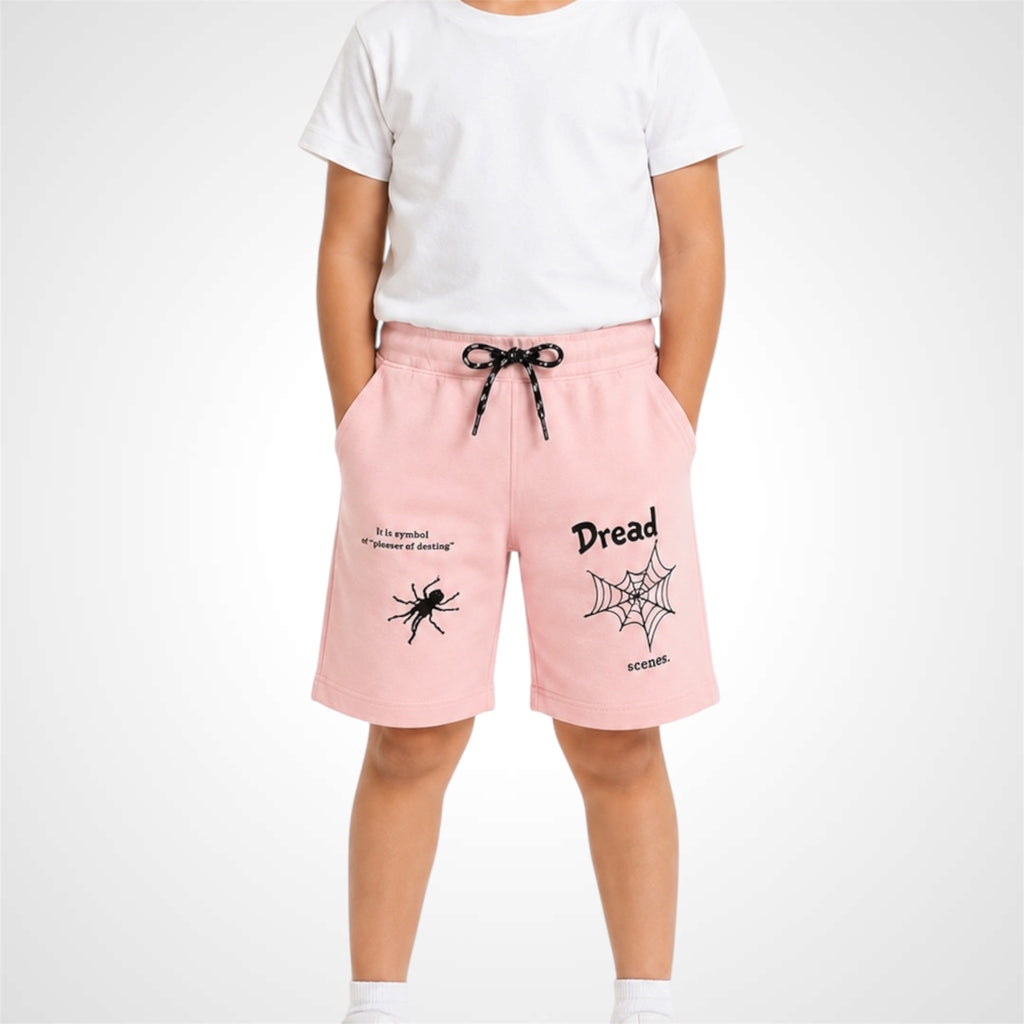 Person wearing pink shorts with text and graphics on a white background