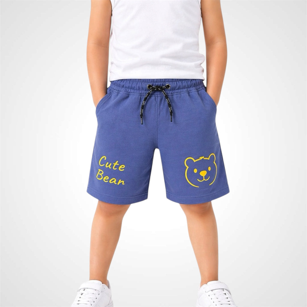Blue shorts with a bear design and 'Cute Bear' text worn by a person on a white background