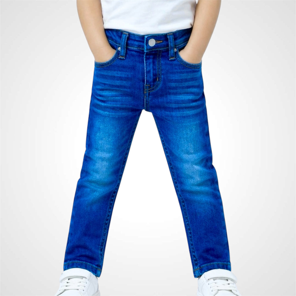 Blue jeans worn by a person on a white background