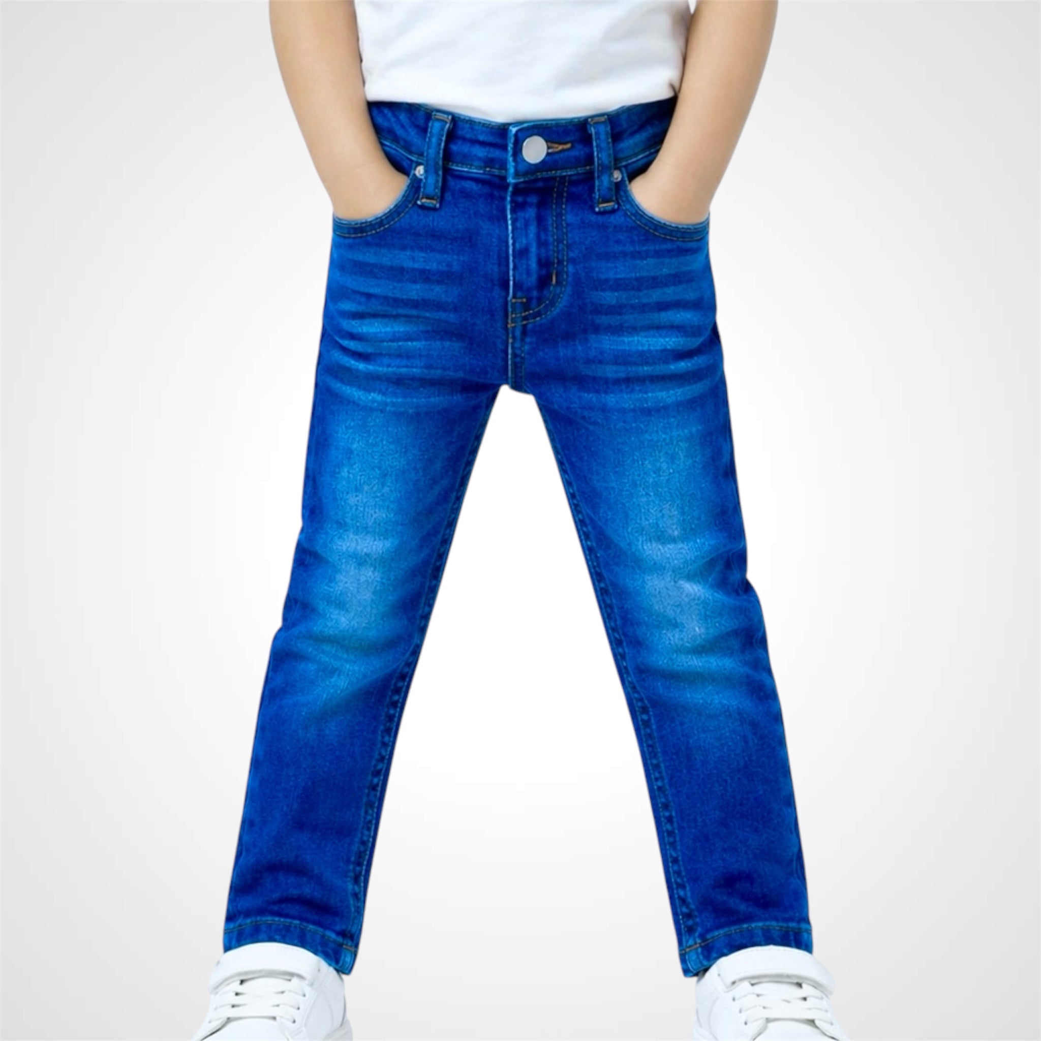 Blue jeans worn by a person on a white background