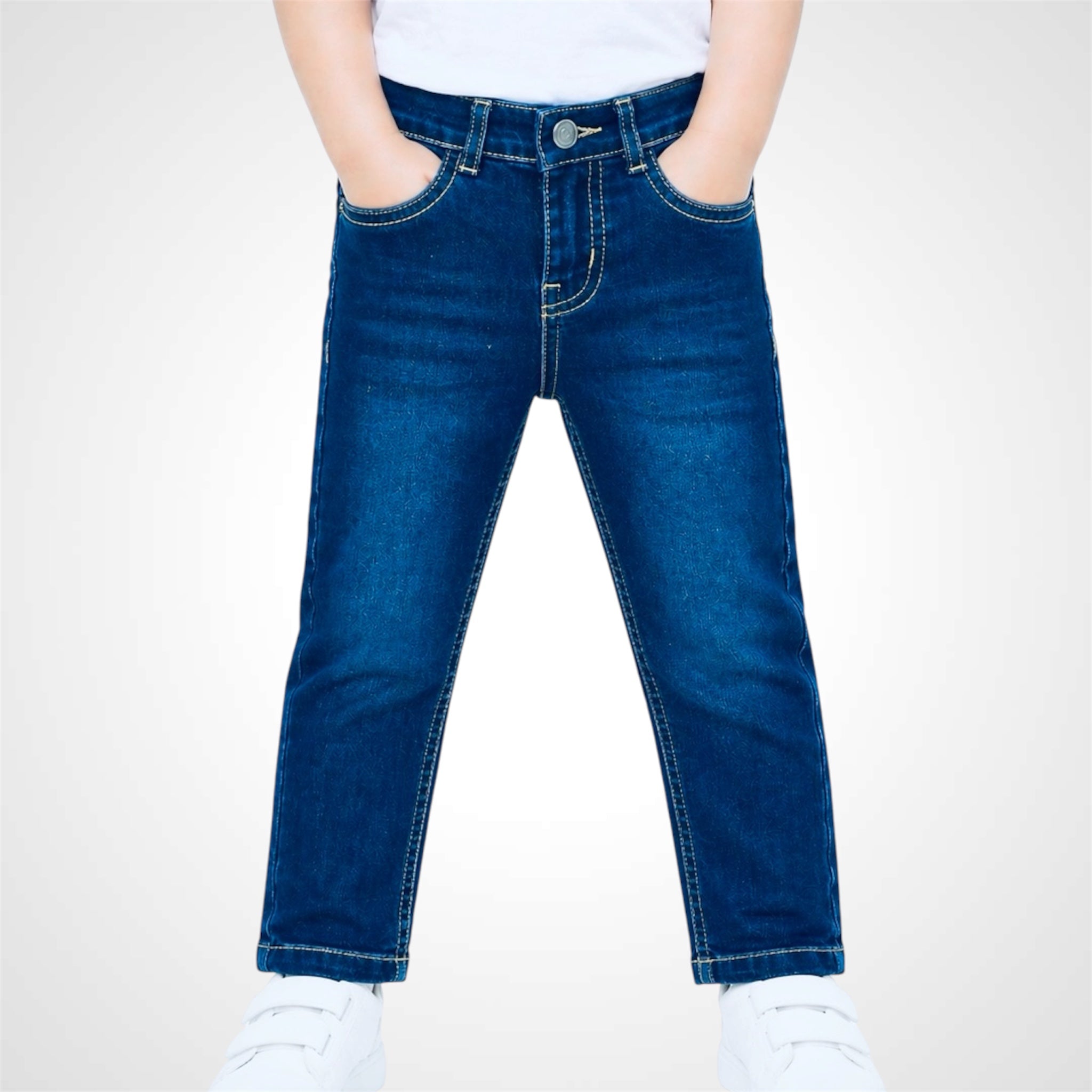 Person wearing blue jeans on a white background