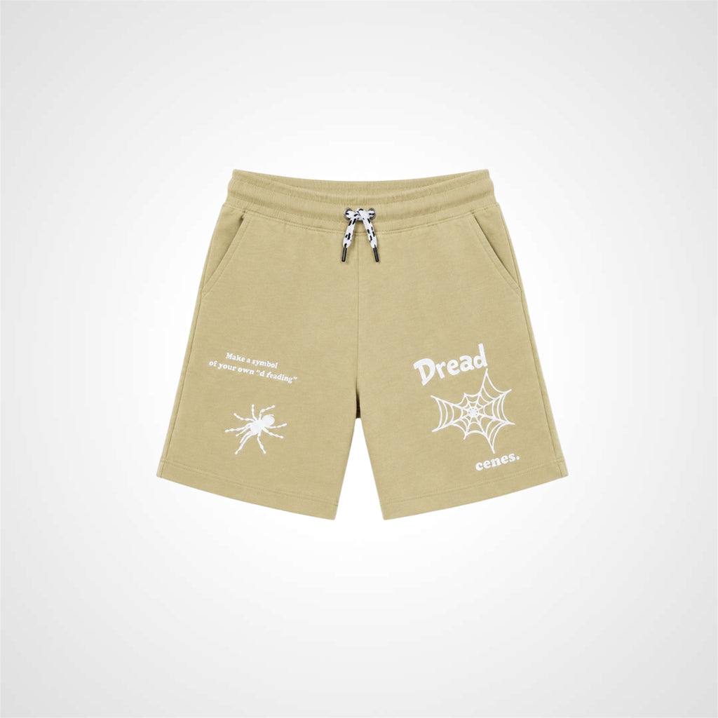 Beige shorts with white graphics and text on a light gray background