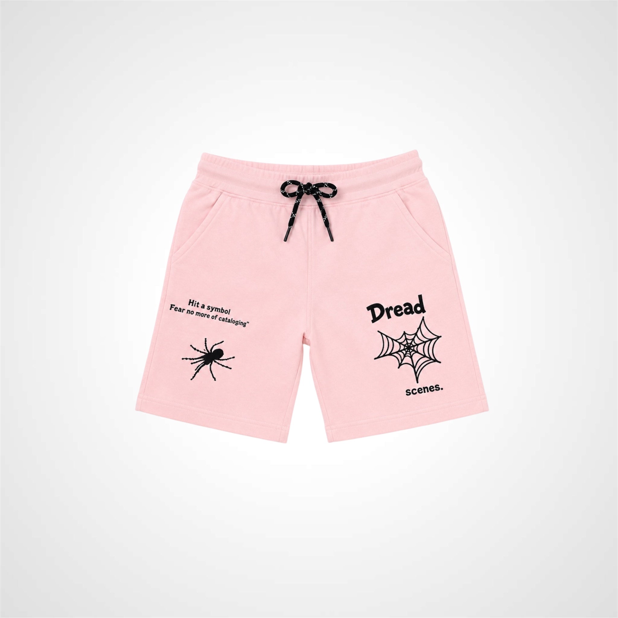 Pink shorts with black text and graphics on a white background