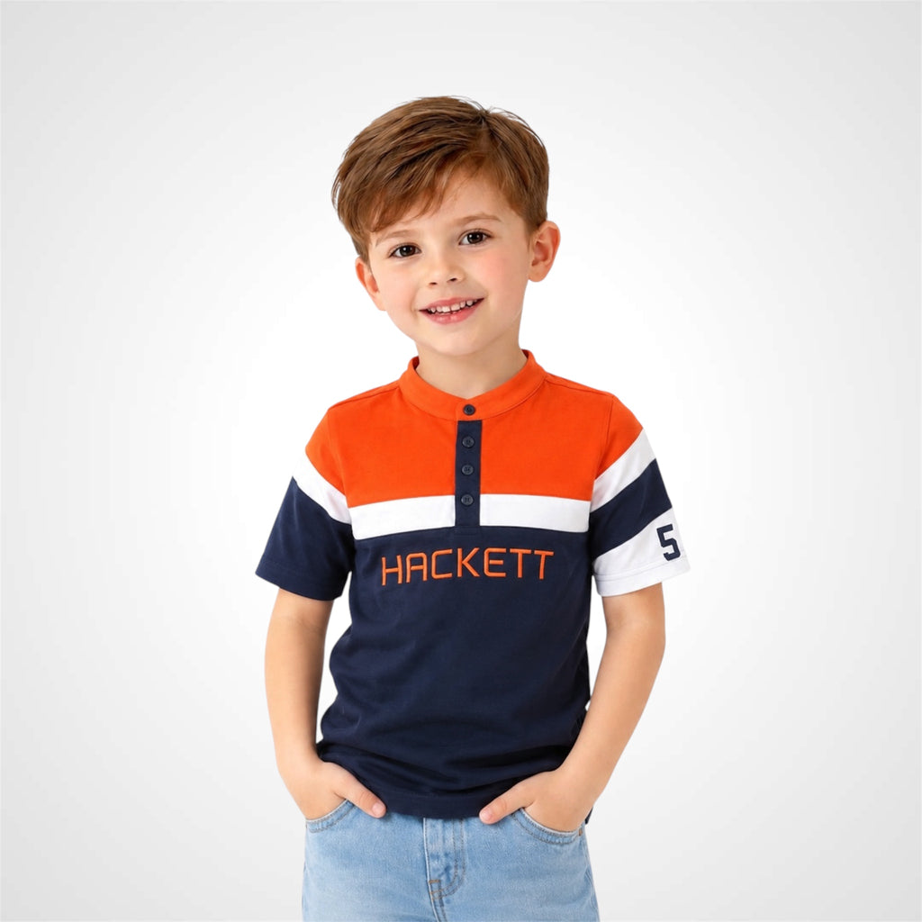 Young boy wearing a stylish Henley neck branded graphic t-shirt