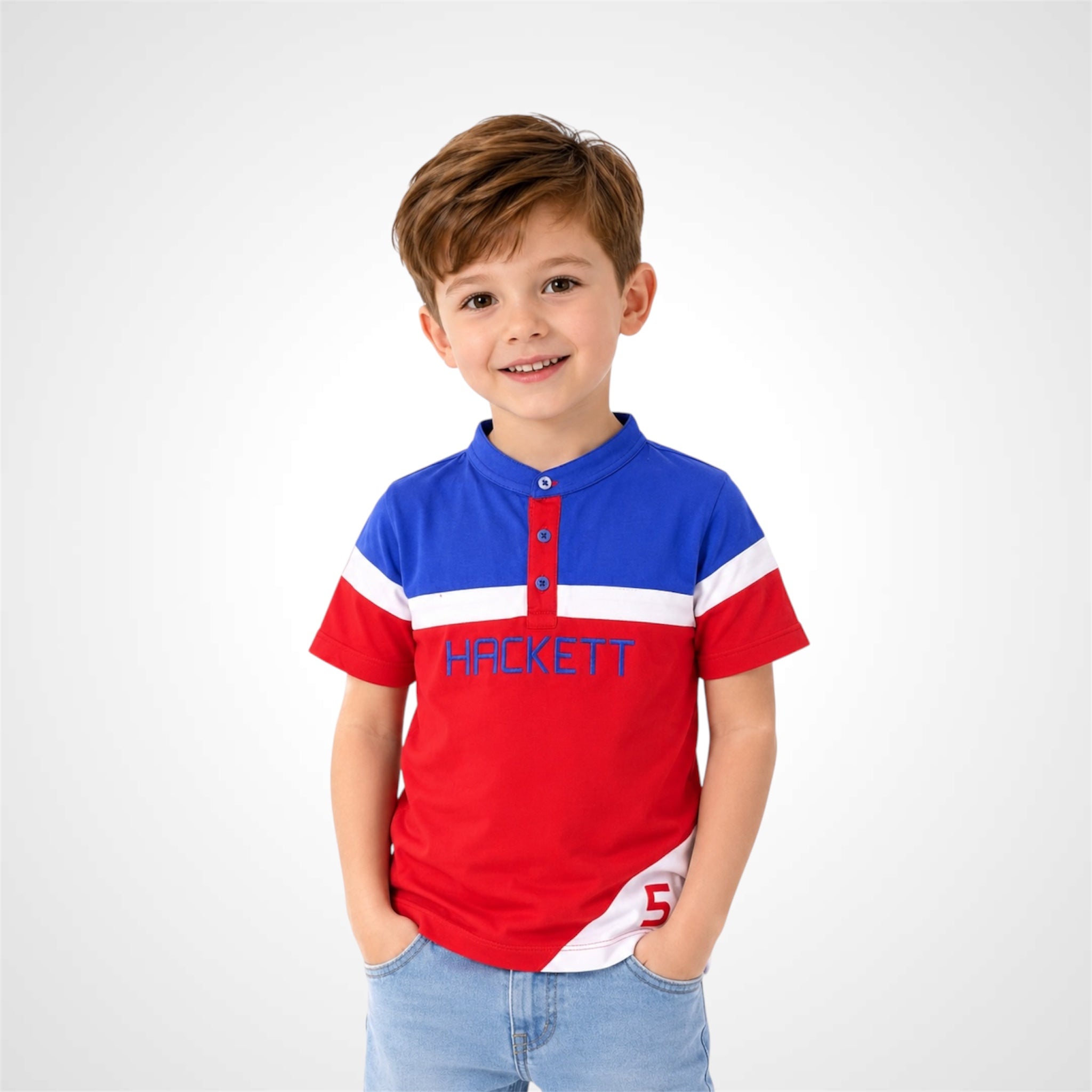 Young boy wearing a stylish Henley neck branded graphic t-shirt