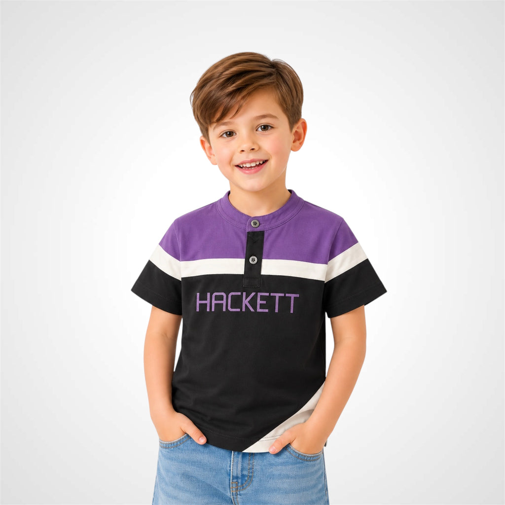 Young boy wearing a stylish Henley neck branded graphic t-shirt