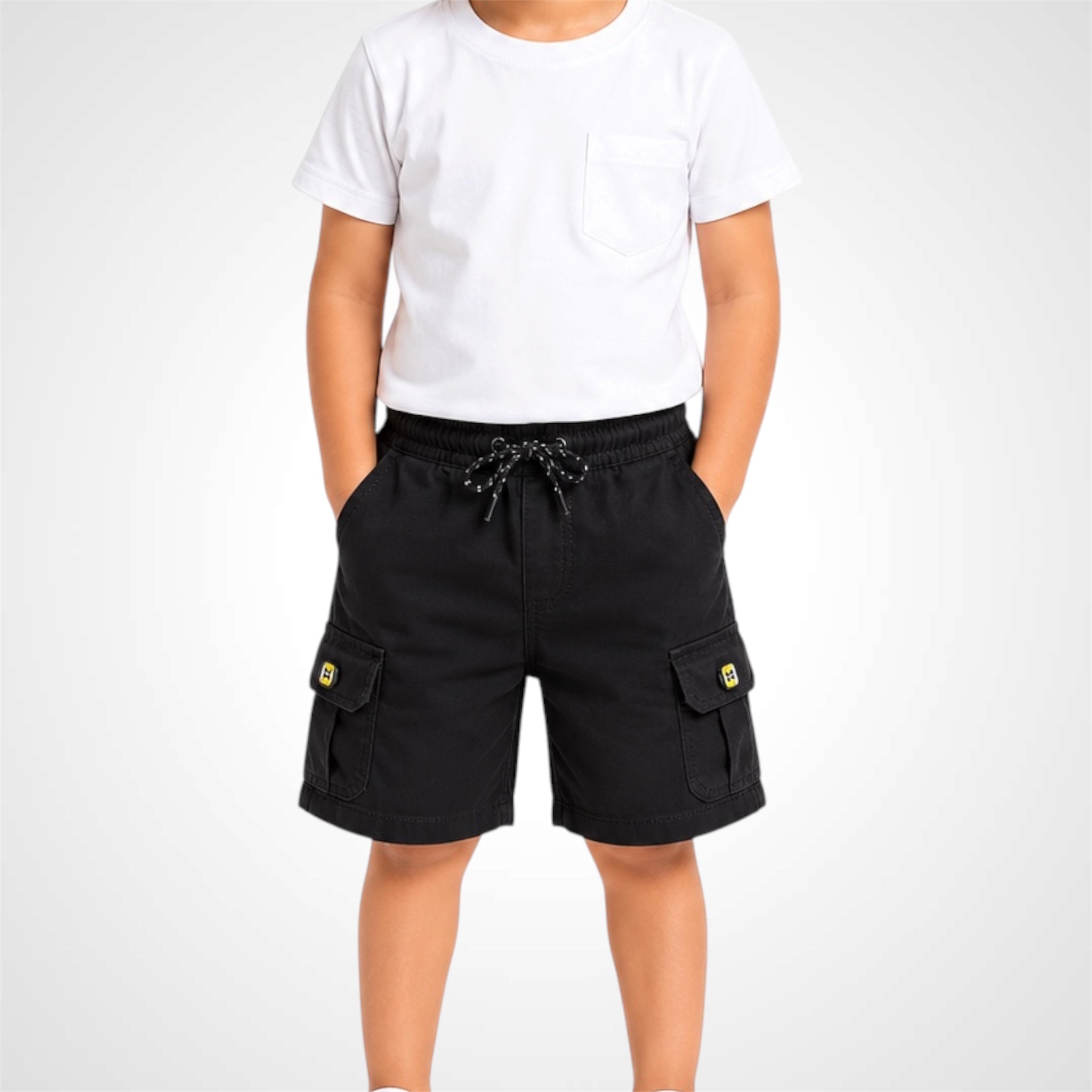 Person wearing black cargo shorts and a white t-shirt on a white background