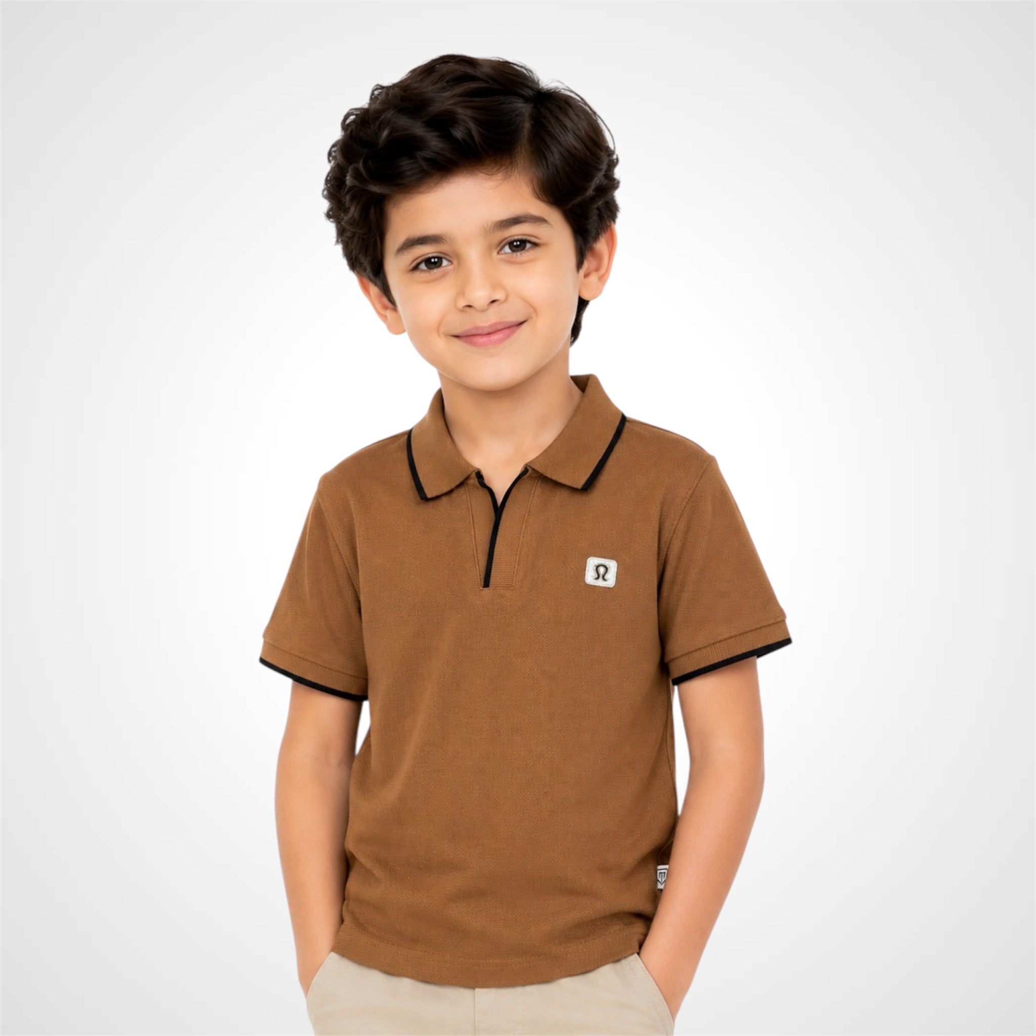 Child wearing a brown polo shirt with a logo on a white background