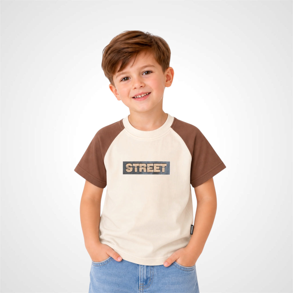 Kids graphic raglan t-shirt with street print for casual wear.