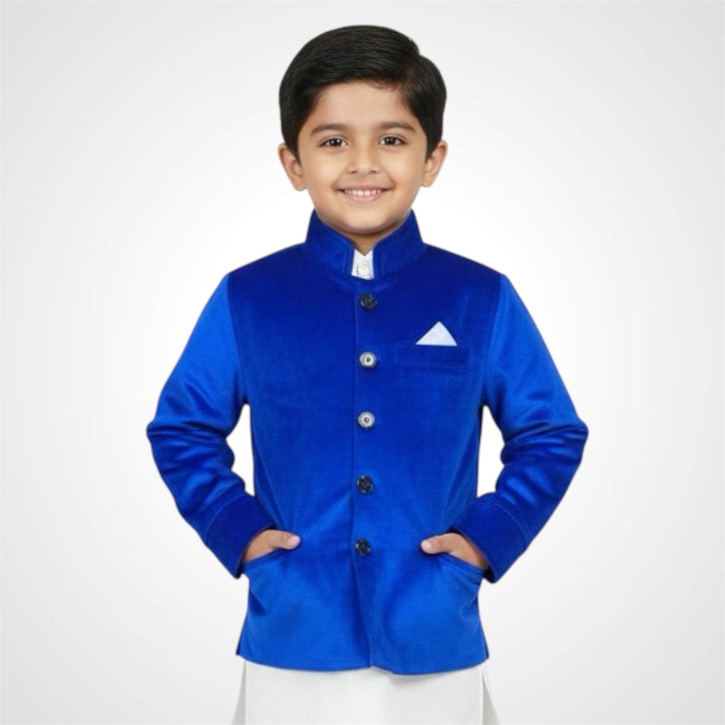 Young boy wearing a Teal Velvet Prince Coat with a Bandhgala collar. Kids luxury festive wear jacket in blue