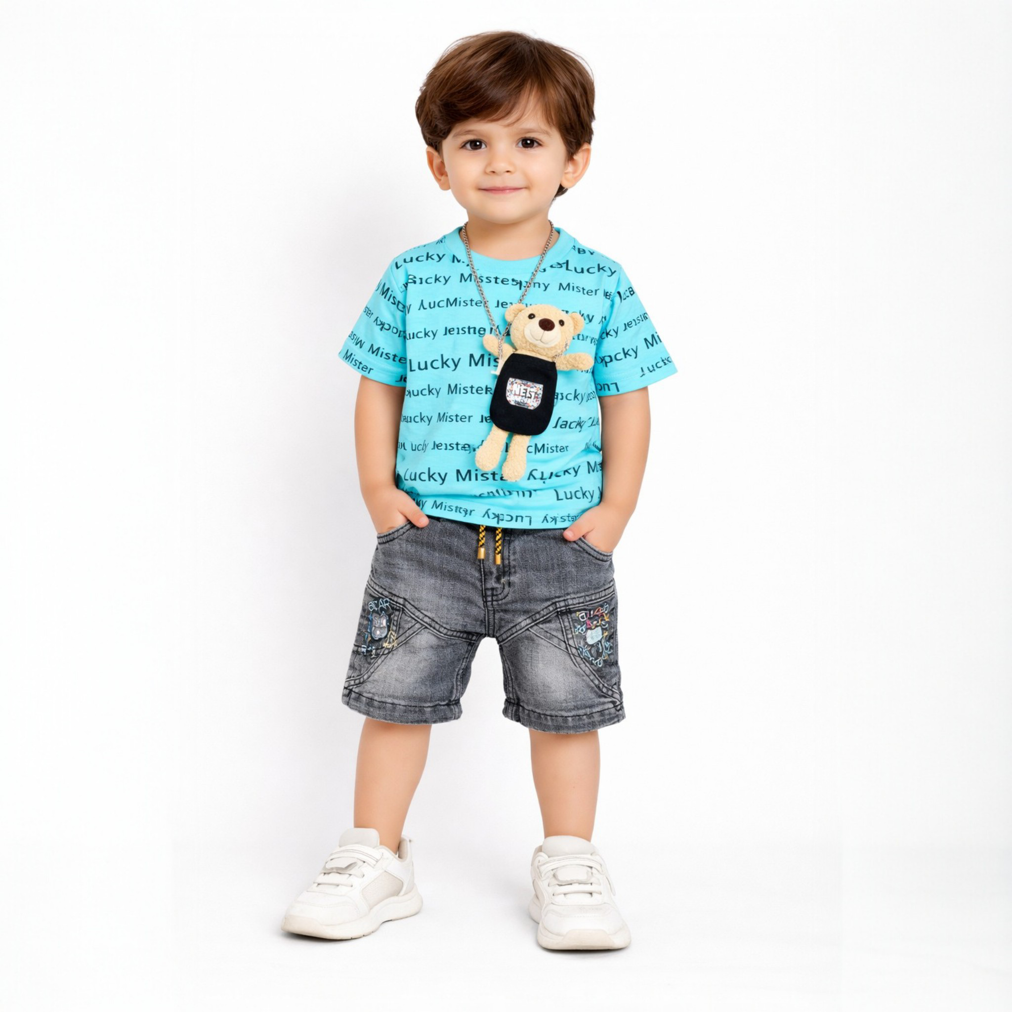 Child wearing a blue t-shirt with a teddy bear graphic and gray shorts on a white background