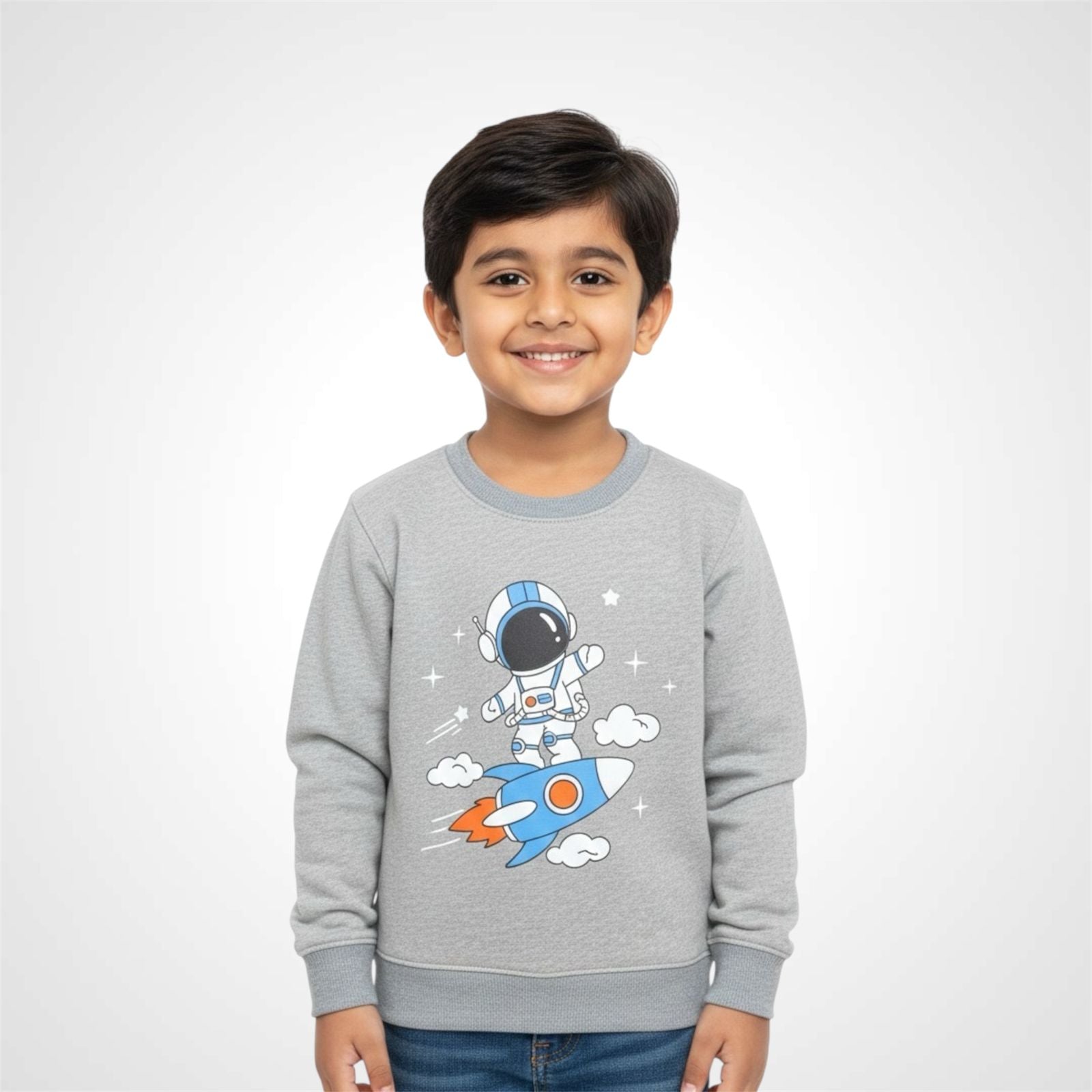 Smiling little boy wearing a grey Toddler & Boys Space Theme Sweatshirt featuring a cute cartoon Astronaut Print riding a rocket grey 