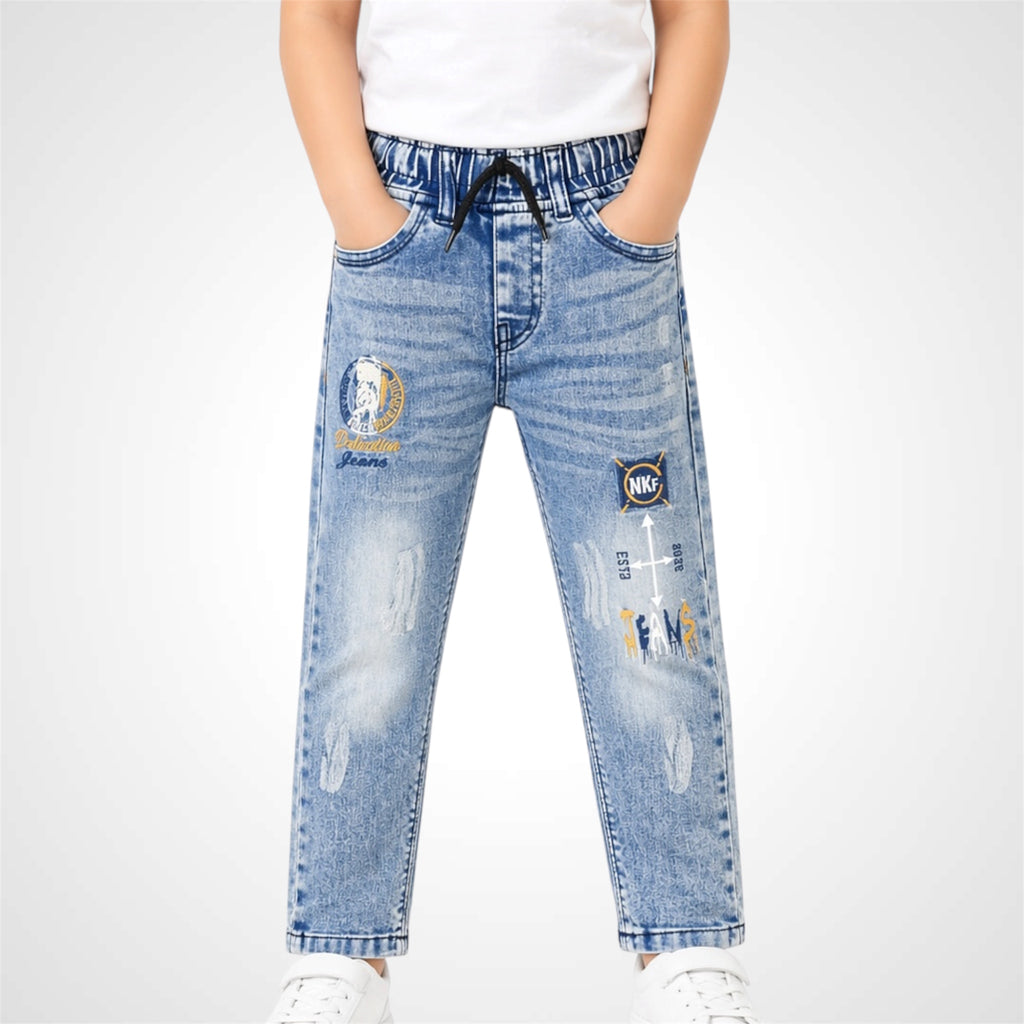Blue jeans with patches and branding on a white background