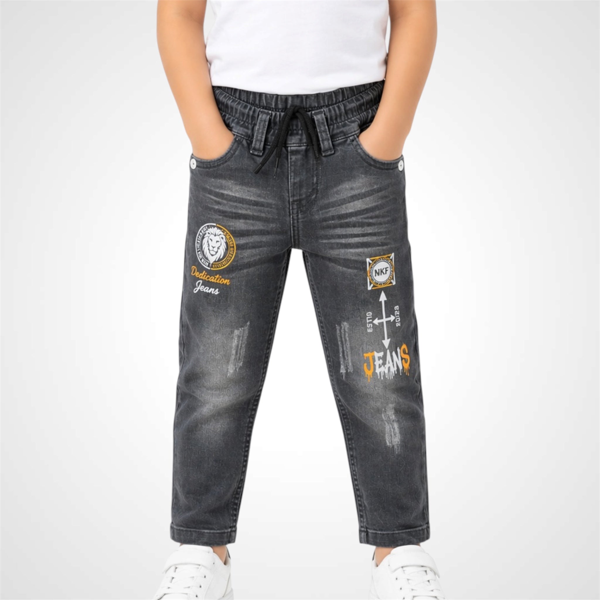 Black jeans with patches and branding on a white background